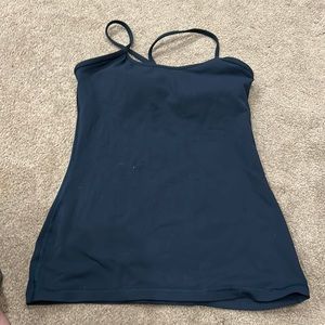 Navy blue lululemon tank with built in bra and removable padding. Size 4